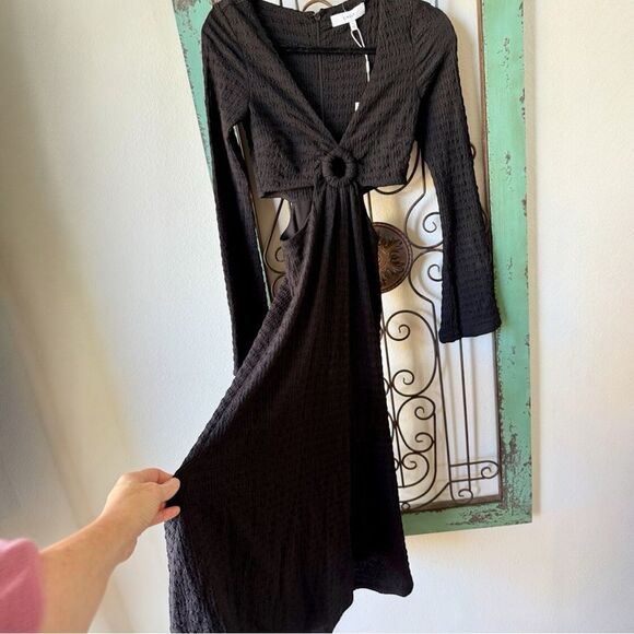 Likely incredibly flattering LBD! This is a size 0 and NW.T.
Homecoming! - Picture 5 of 8